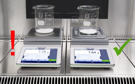 Can I operate my precision balance in a fume hood? Can air drafts influence my results? 